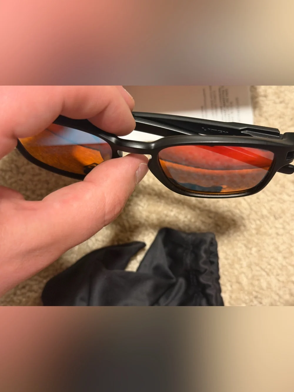 Oakley Latch Black Frame Sunglasses with Red Lenses